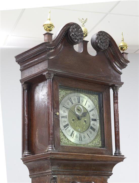 Peter Hathorn Thrut. A George III oak cased eight day longcase clock, 7ft 5in.